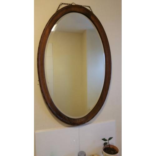 Oval large mirror with wooden border, in excellent condition, for sale