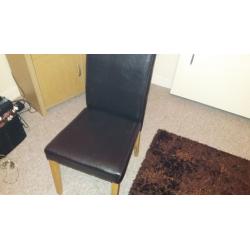 Brown lether chair bran new in box