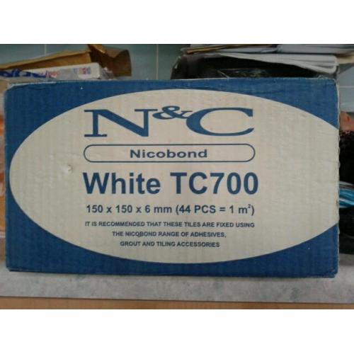 12 Boxes of 'WHITE' Tiles.