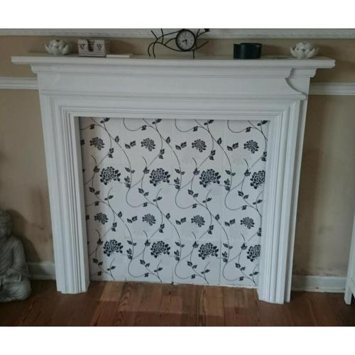 White wooden mantle fire surround