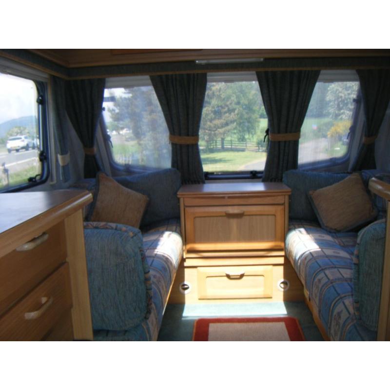 Elddis Hurricane EX 2000 with Awning and Electric Steady Legs.