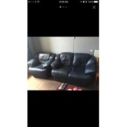 Dark navy blue leather sofas. 2+1