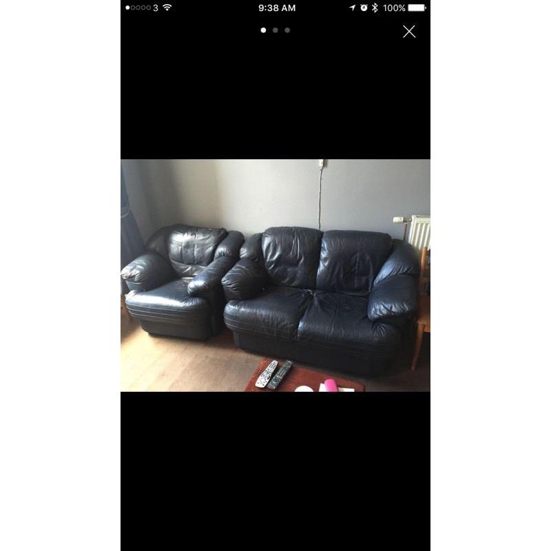 Dark navy blue leather sofas. 2+1
