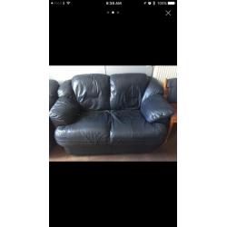 Dark navy blue leather sofas. 2+1