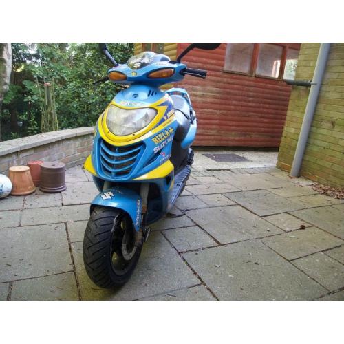 Summer's here! Time to get out on a bright moped?