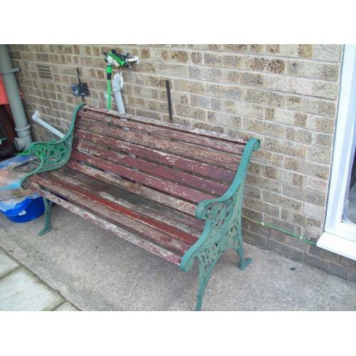 cast iron garden bench needs refurb, wheel & scroll detailing, very heavy