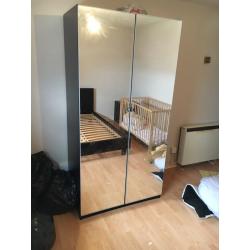 MIRROR DOUBLE DOOR WARDROBE with BLACK DOUBLE BED AND 2 bedside cupboards