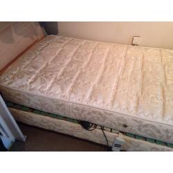 Single electric bed. Never used. Perfect working order. Wooden headboard