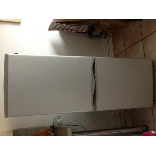 Essentials fridge/ freezer under year old in silver