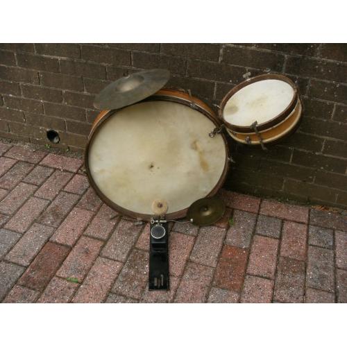 Vintage wooden childs drum kit.