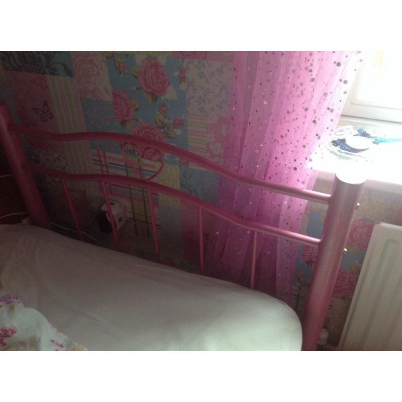 Pink metal bed frame