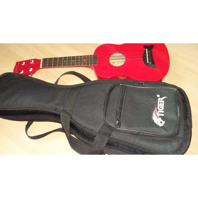 UKELELE MAKALA RED WITH PADDED TIGER CASE IN VERY GOOD CONDITIONS