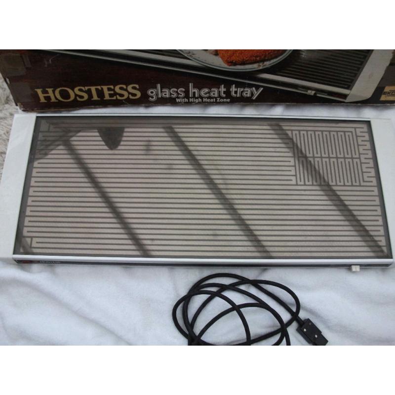 HOSTESS Glass heat tray with rapid heat area.