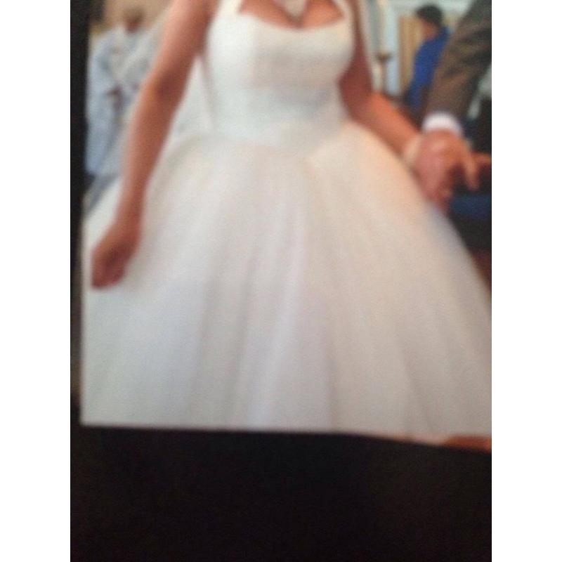 Stunning cream princess style wedding dress