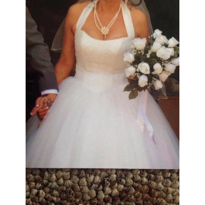 Stunning cream princess style wedding dress