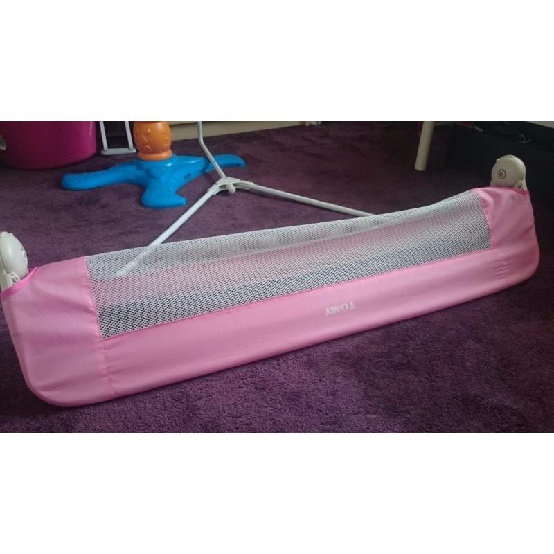 Child safety bed rail.