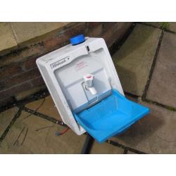 Heated water hand wash container