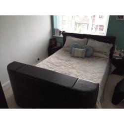 Very dark brown/black tv bed