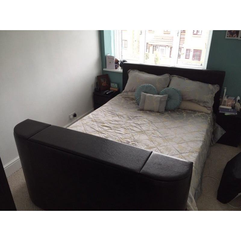 Very dark brown/black tv bed