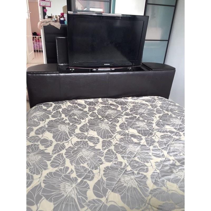 Very dark brown/black tv bed