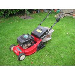 Self Propelled rotary mower with roller for striped finish