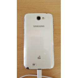 White Samsung note 2 for sale needs new simcard part . In good condition otherwise.