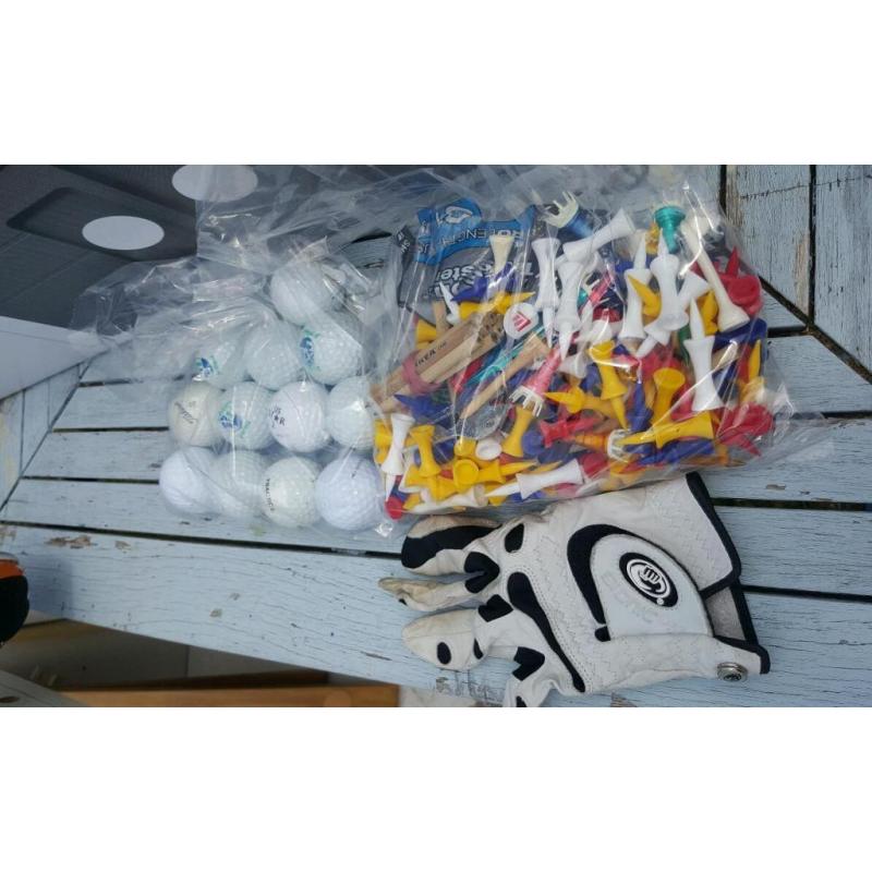 Large bag of Tees 20 new golf balls and a glove