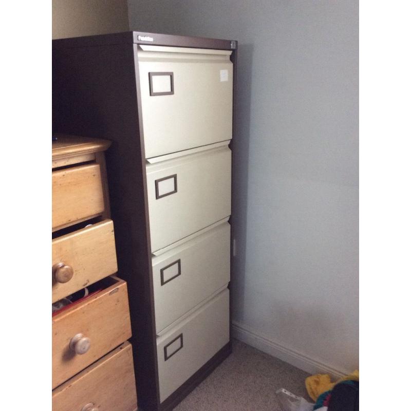 4 drawer lockable filing cabinet by Punchline. Brown body cream front. Excellent condition