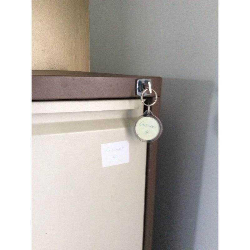 4 drawer lockable filing cabinet by Punchline. Brown body cream front. Excellent condition