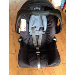 Graco junior group 0+ car seat and car seat base.