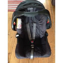Graco junior group 0+ car seat and car seat base.