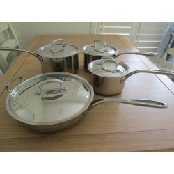 SET OF THREE QUALITY SAUCEPANS AND FRYING PAN ALL WITH LIDS COPPER BOTTOMS