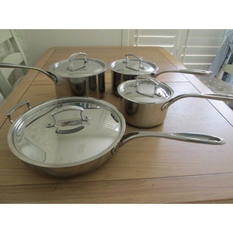 SET OF THREE QUALITY SAUCEPANS AND FRYING PAN ALL WITH LIDS COPPER BOTTOMS