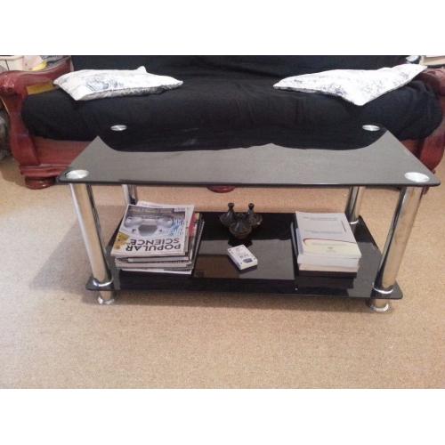 Black glass coffee/lounge table