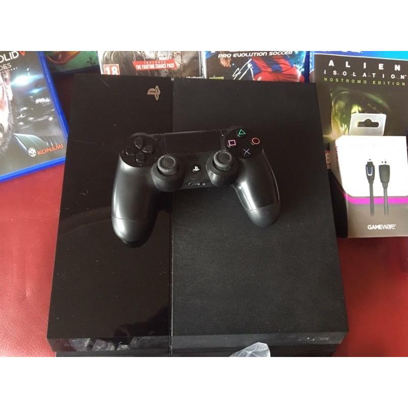 PlayStation 4. with 14 top games*FULLY BOXED*
