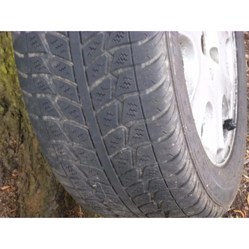 Four winter tyres on wheels for Volvo V70 D5