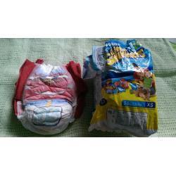 Free disposable nappies + swim nappies size 2