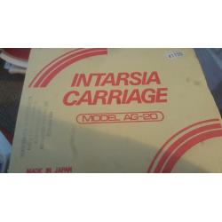 Intarsia carriage