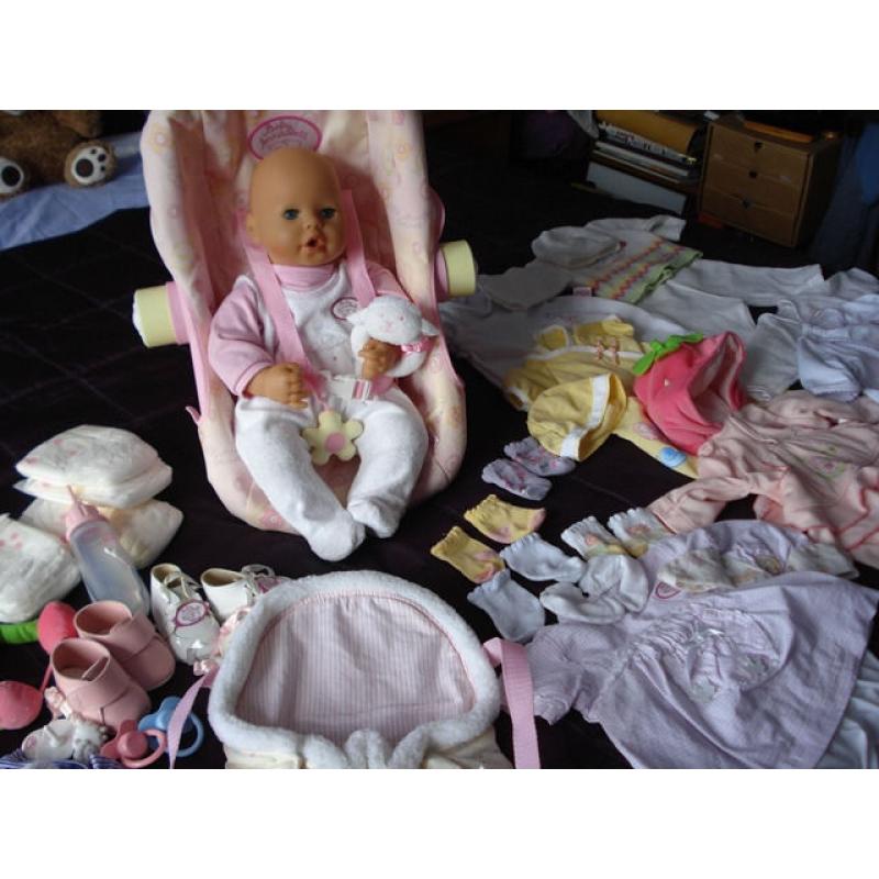 FOR SALE - BABY ANNABELL DOLL, CARRYTOT CHAIR, BABYSLING CARRIER, CLOTHES ETC