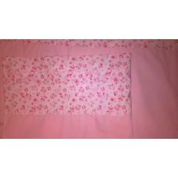 pink curtains with cute bow ties on top and pink detailing on the bottom