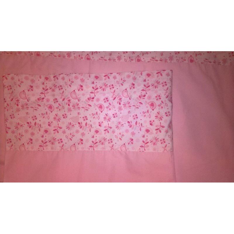 pink curtains with cute bow ties on top and pink detailing on the bottom