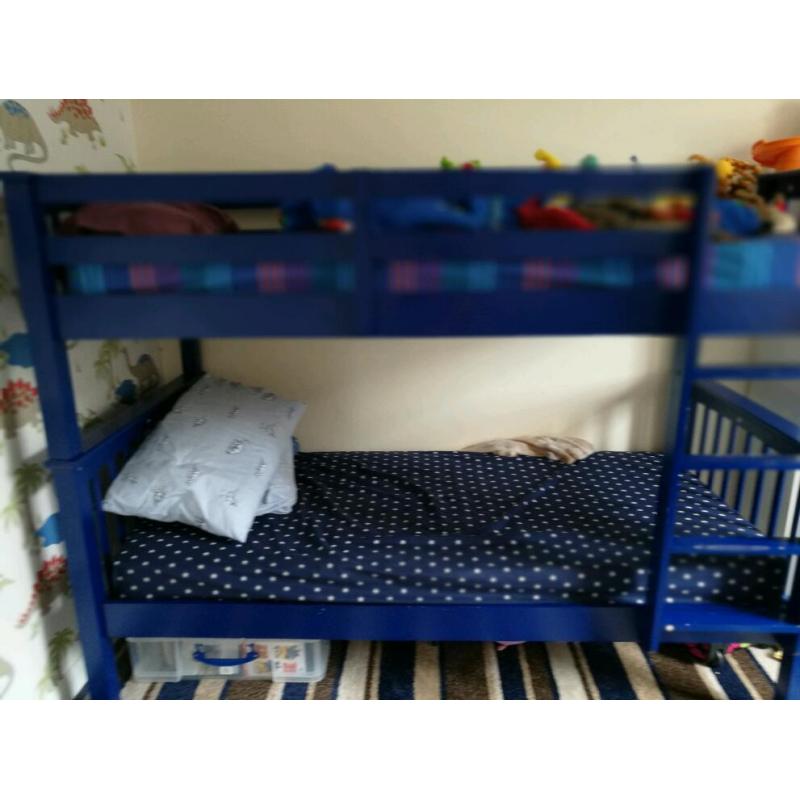 Blue wooden bunk beds