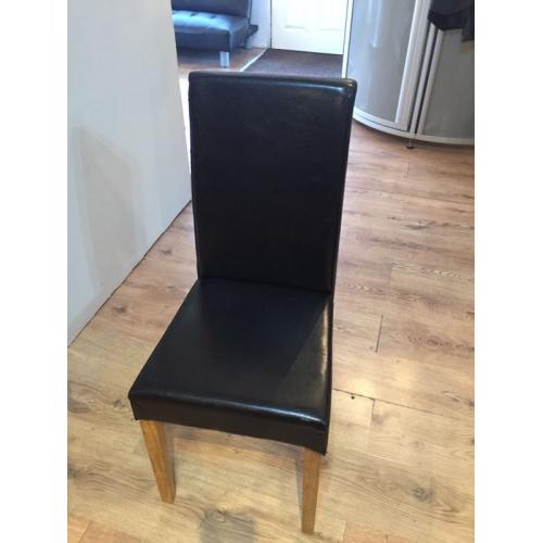 6 Faux leather black chairs