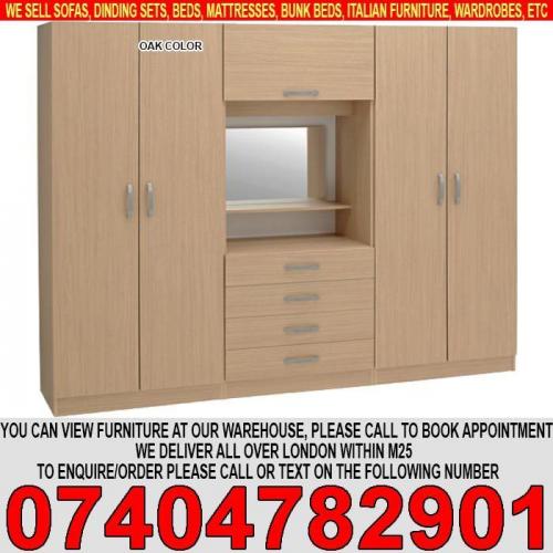 Fully Assembled 4 Door wardrob with Dresser, Mirror, Shelves, Rails BRAND NEW