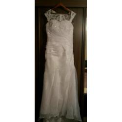 wedding dress-white. Never worn.
