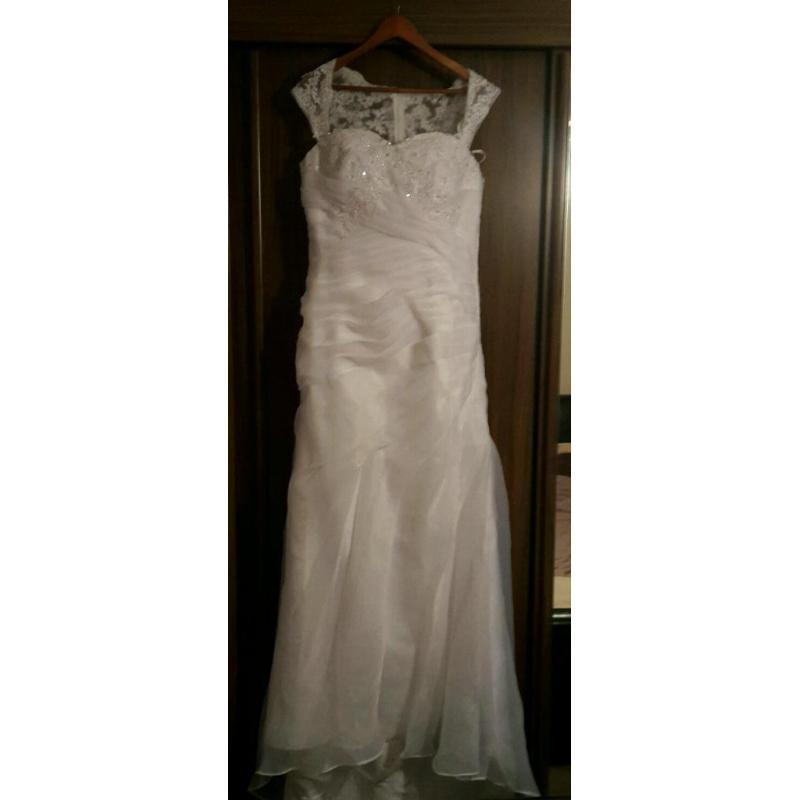 wedding dress-white. Never worn.
