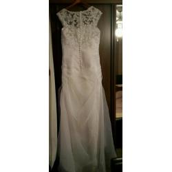 wedding dress-white. Never worn.