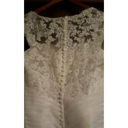 wedding dress-white. Never worn.