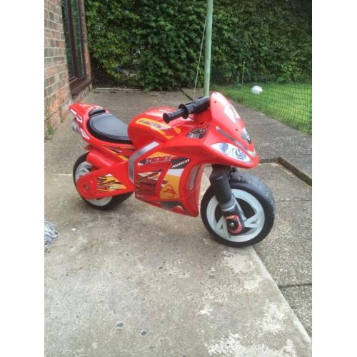 Kids ride on motorbike