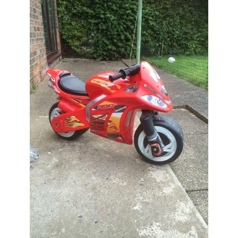 Kids ride on motorbike